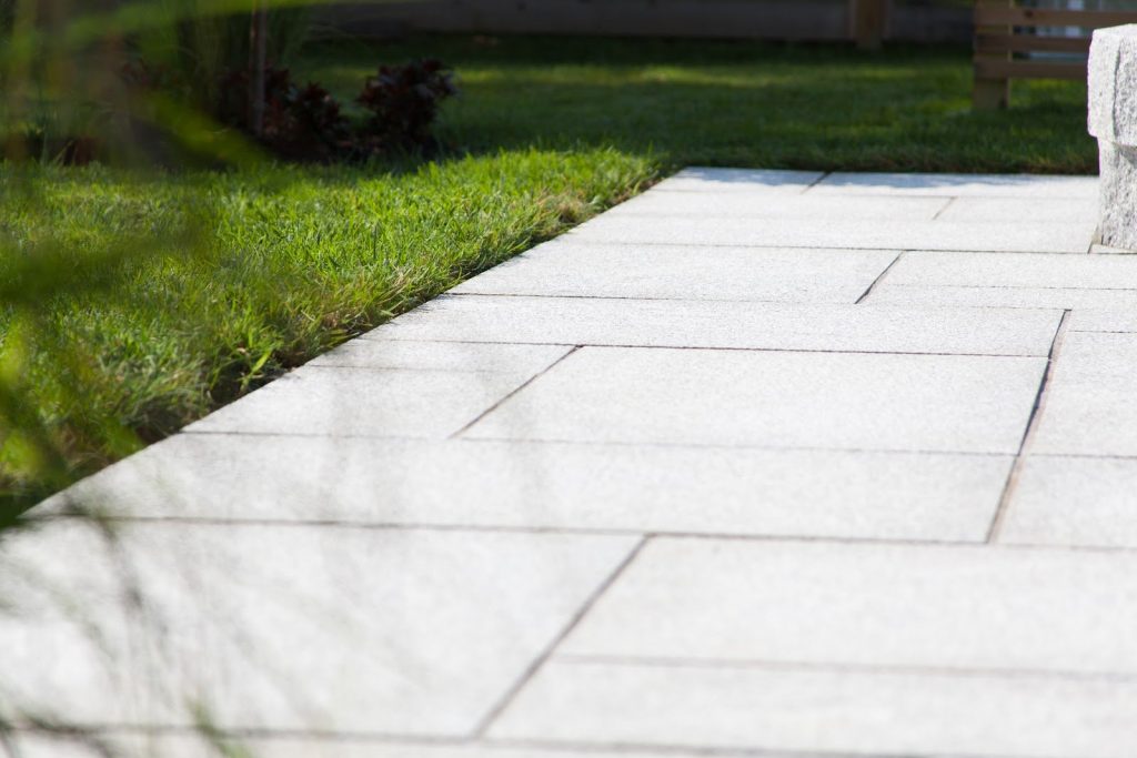 This image has an empty alt attribute; its file name is granite-patio-sets-the-stage-for-lifes-moments-video-sep-09-2020-01-15-12-79-pm-1024x683.jpeg